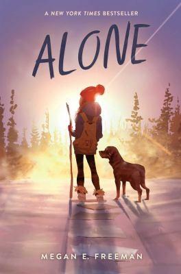 Girl standing in a snowy forest holding a large stick with her dog beside her. She is dressed in winter clothing. 