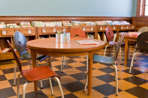 round table with four chairs around it 