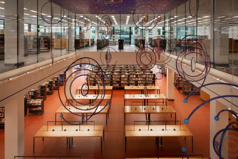 aerial view of a large room filled with reading tables