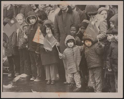 Families watching the 1961 Chinese Lunar New Year Parade
