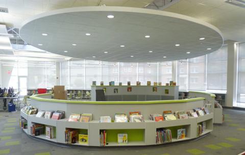 round bookshelves with a story area in the middle