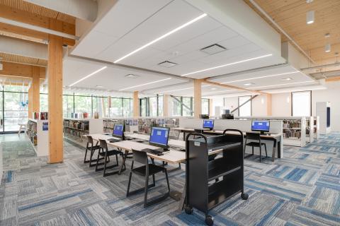 large room with computer stations