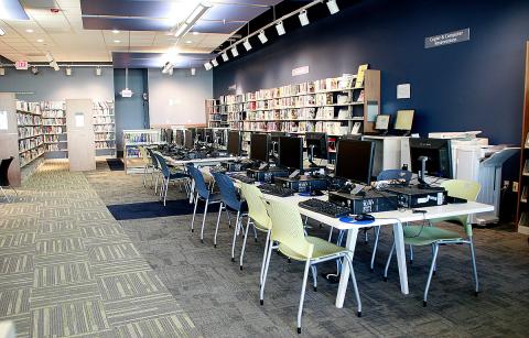 long table with desktop computer stations