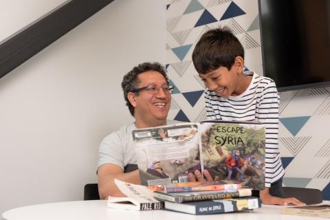 Father and Son Reading at Southwest Library