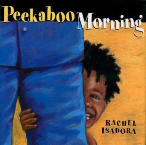 Book cover of Peekaboo Morning. Illustration of a baby with brown skin and curly black hair, peeking out from behind a grown-up who is standing in front of them.