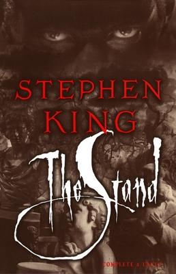 The Stand book cover - dark background and ominous eyes at the top of the page
