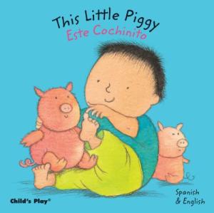 Book cover of This Little Piggy/Este Cochinito. Simple illustration of a baby touching their toes, holding a piglet, with another piglet in the background.