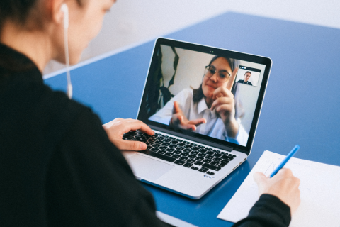 Two women on a video call speaking America Sign Language