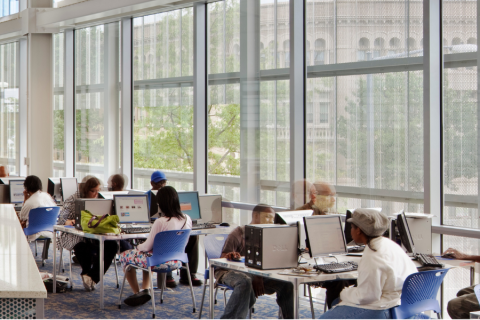 People using the public computers at the Shaw/Watha T. Daniel Library