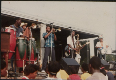 photo of the band members of Heavy Connection performing on stage