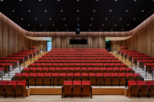 straight on view of red auditorium seating from stage